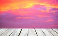 Empty wood desk colorful skyÃÂ  twilight sky after sunset with cloudsÃÂ for background .Blank space for text and images